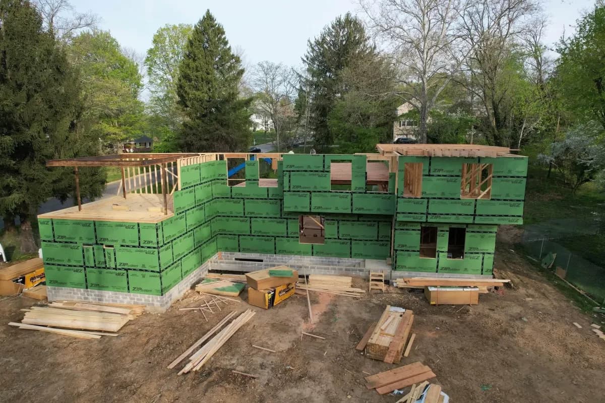 Aerial drone view of ZIP System green sheathing on roof — Treacy Brothers new construction